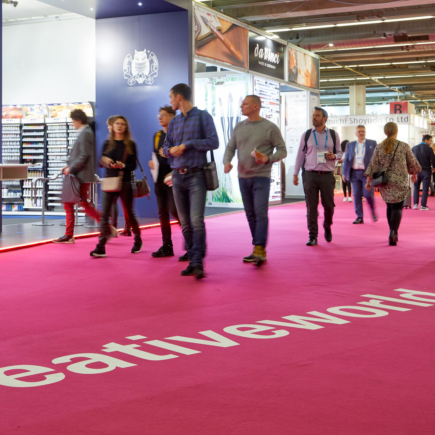 Visitors walking in the Creativeworld hall